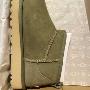 Brand new with tags and box. Olive color mini Uggs. Super cute.